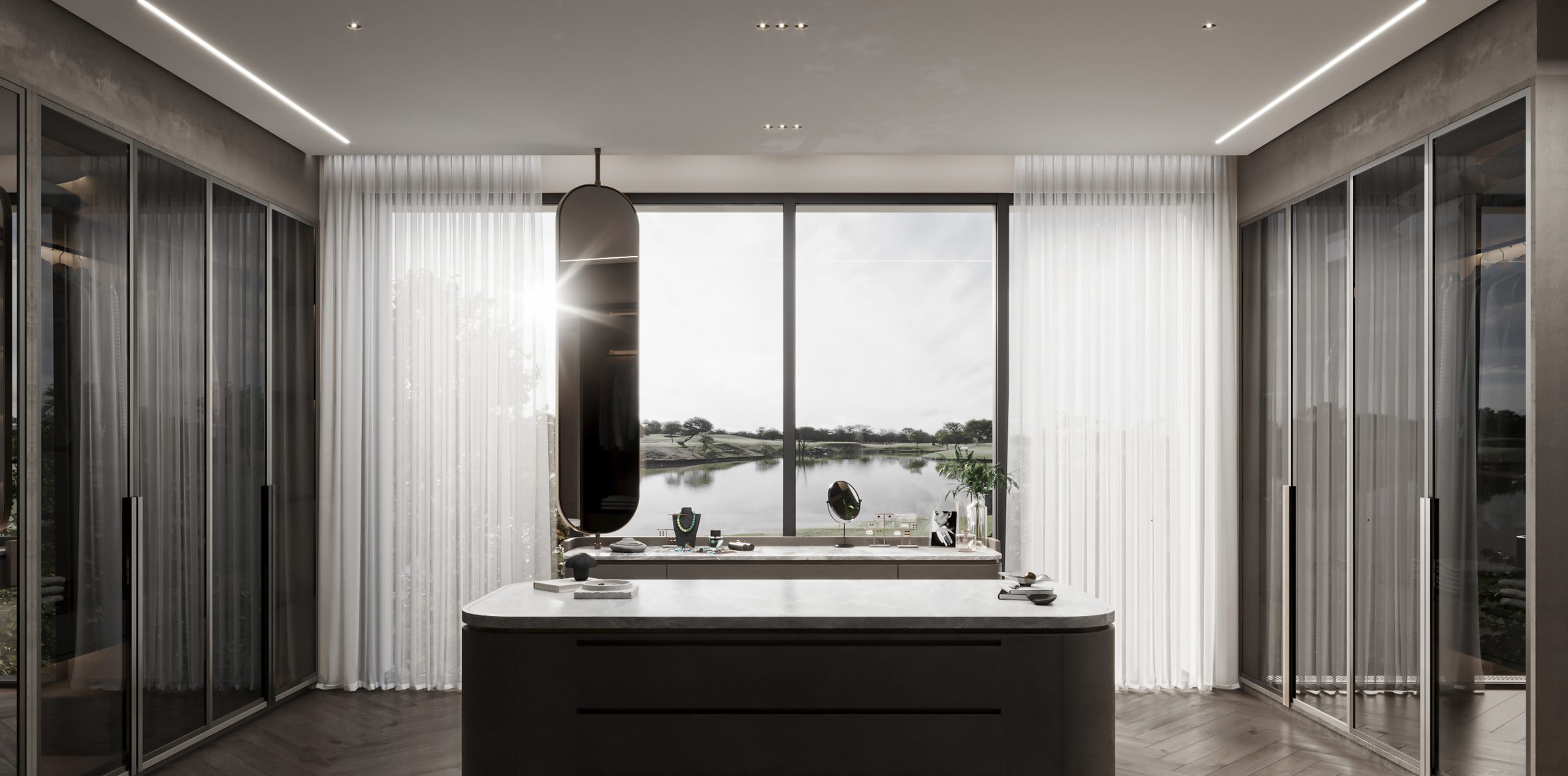 Dressing room with glass-fronted wardrobes and a black island, The Mirage Villa master suite